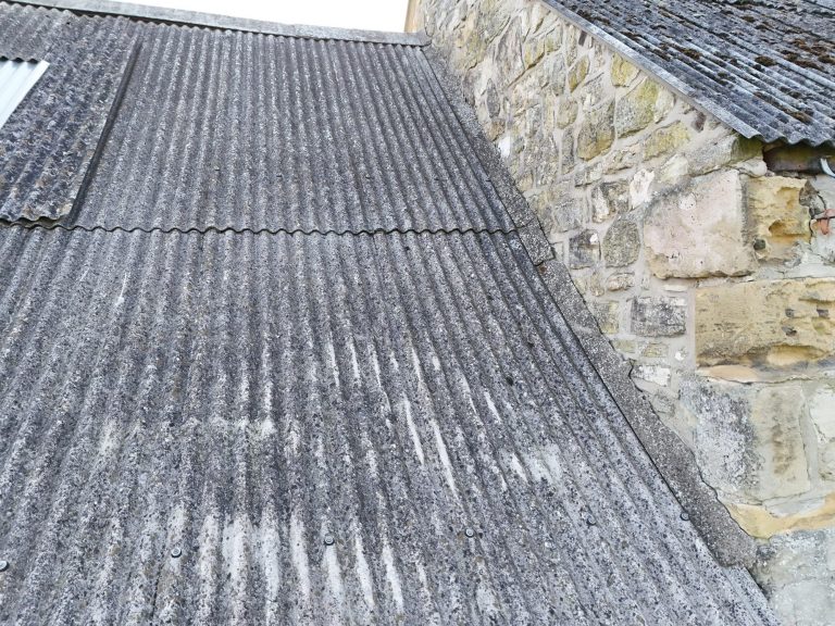 Corrugated asbestos roof in good condition.